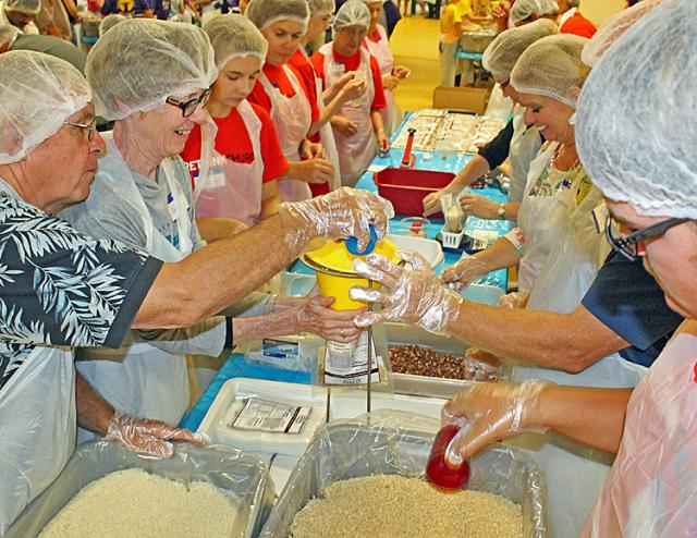 Vinton Feeds the World: Hundreds of volunteers filled 36,000 bags on Sunday.