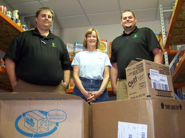 Monkeytown's Jason Hebert & Shawn Voss with Benton County Food Pantry Co-Director Sherry Crawford
