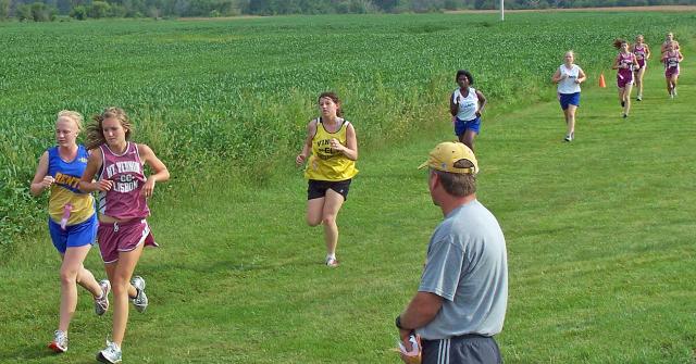 Coach John Frazier watches as the V-S girls compete.