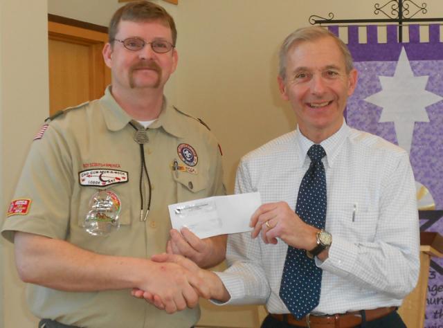Boy Scout Troop 47 Scoutmaster receives 100+ 1 gift from Bethlehem Lutheran Church Pres.George Bauer