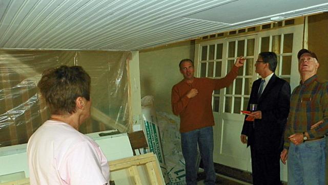 Rich Hainstock points out the changes he is making to the building.