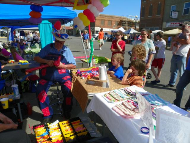 Many children lined up for balloons at Boomfest.