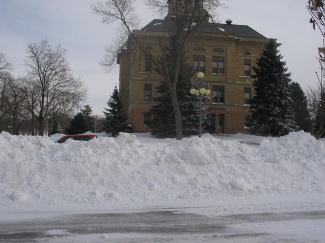 Benton County Courthouse surrounded on all sides by the huge piles of snow