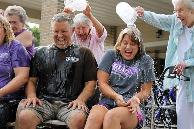 Ice Bucket Plunge at Lutheran Home: Todd Gloede and Jessica Rippel react to the cold water.