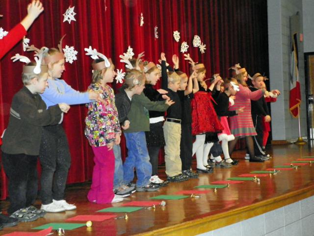 That's what it's all about in the winter: Tilford 1B students dance the Reindeer-Pokey.