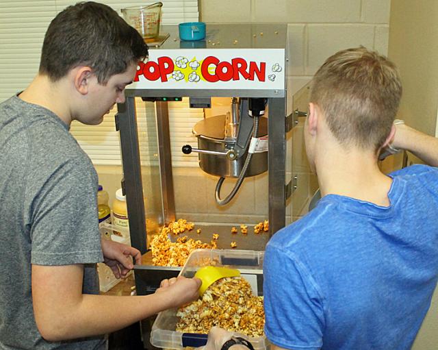 Josh Shafer and Jordan Womochil are among VSHS students working on a new caramel corn project.