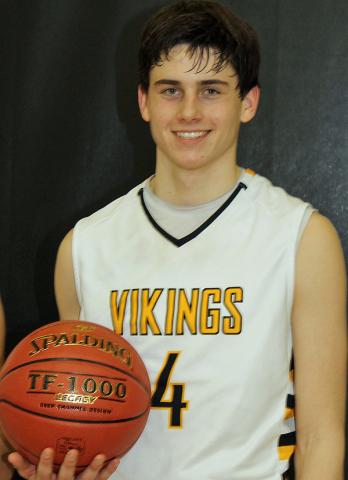 Grant Sagan holds the basketball he used to score his 1000th point Tuesday vs. Oelwein.