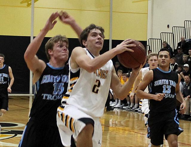 Kelyn Rickels was fouled as he drove to the basket on this play.