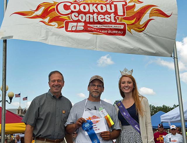 Cook-Off King Phil Cummings, with IFBF Pres. Craig Hill and Iowa State Fair Queen Elizabeth Glover.