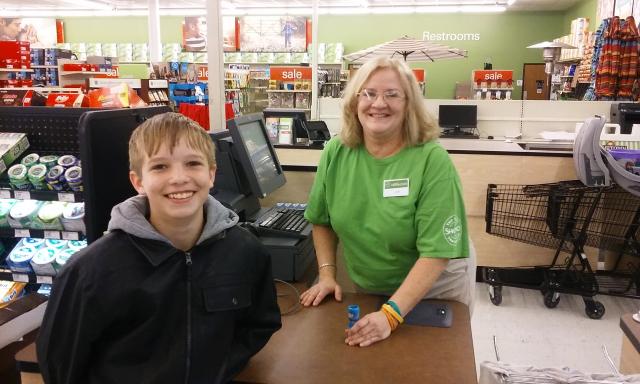 1st customer: Cale Butts made the very first purchase at Shopko today, from clerk Lori Polesky.