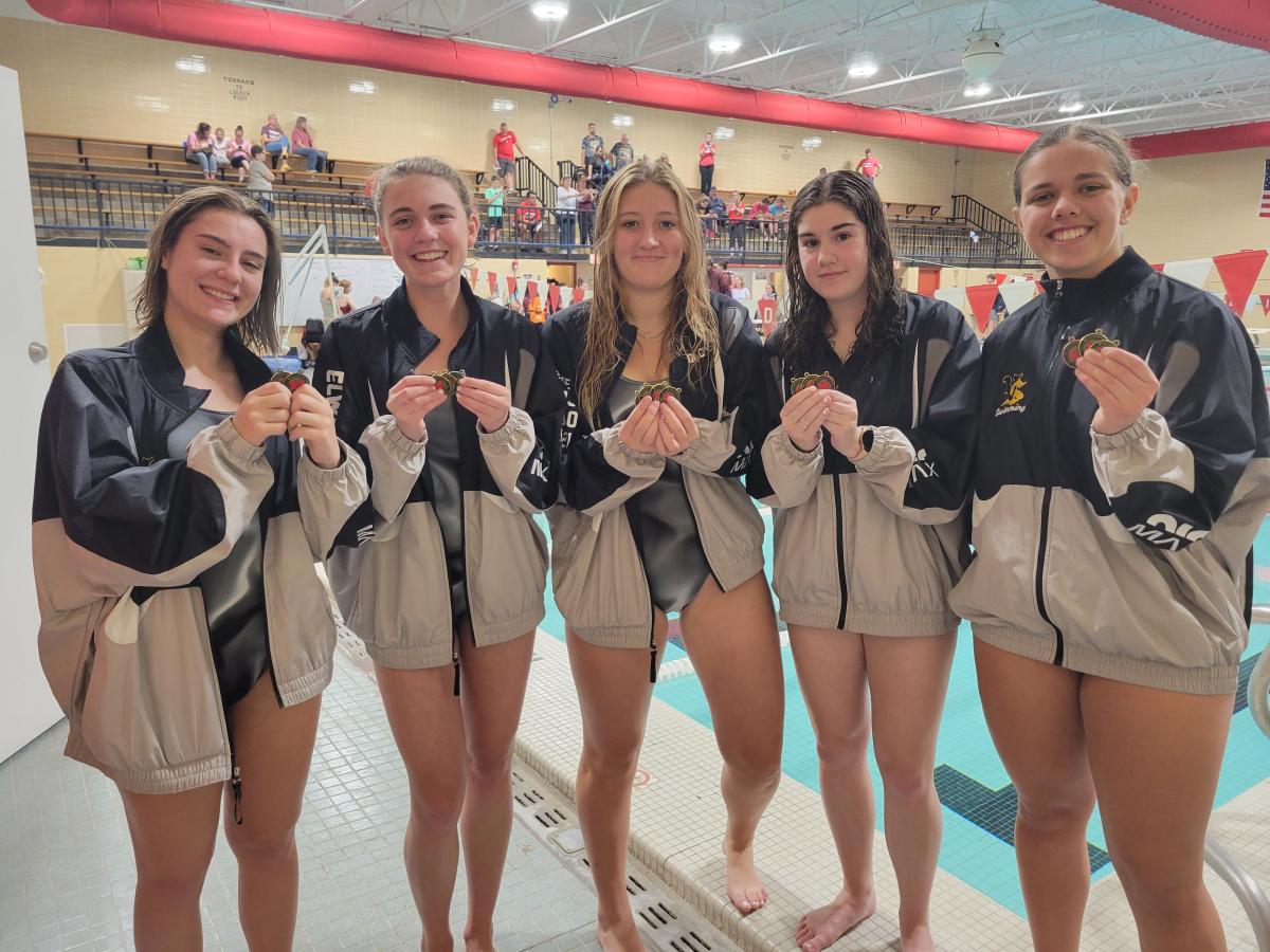 Olivia Schminke, Tori Elwick, Justyce Dominick, Lauren Moore & Carleigh Wilson with their medals.