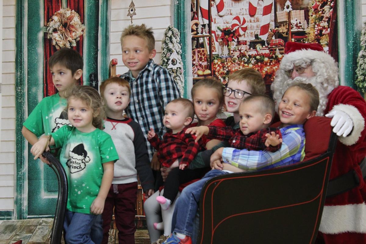 Santa with children who came out to have breakfast and visit 