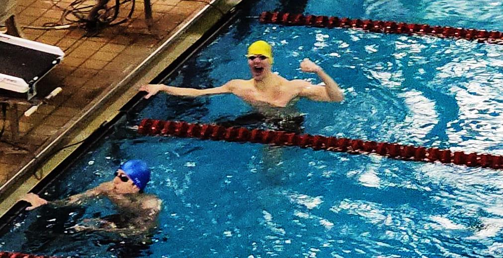 Ian Allsup celebrating one of his wins in the pool. He also broke both his brother Isaac's and the Conference Meet records!. Click to read article