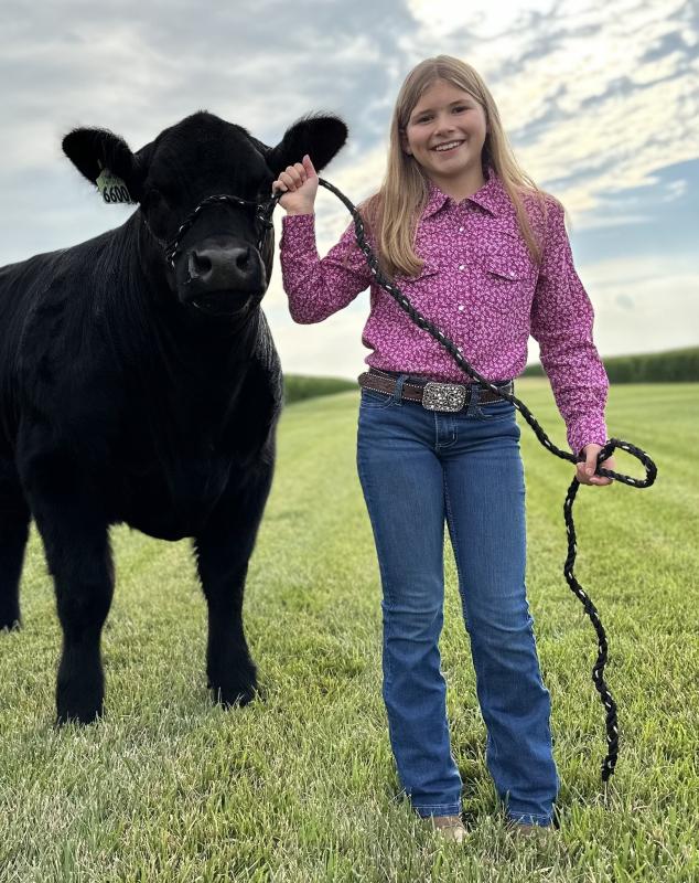 Emma Wayson of Mt. Auburn wins Grand Champion Showman with her steer Junior