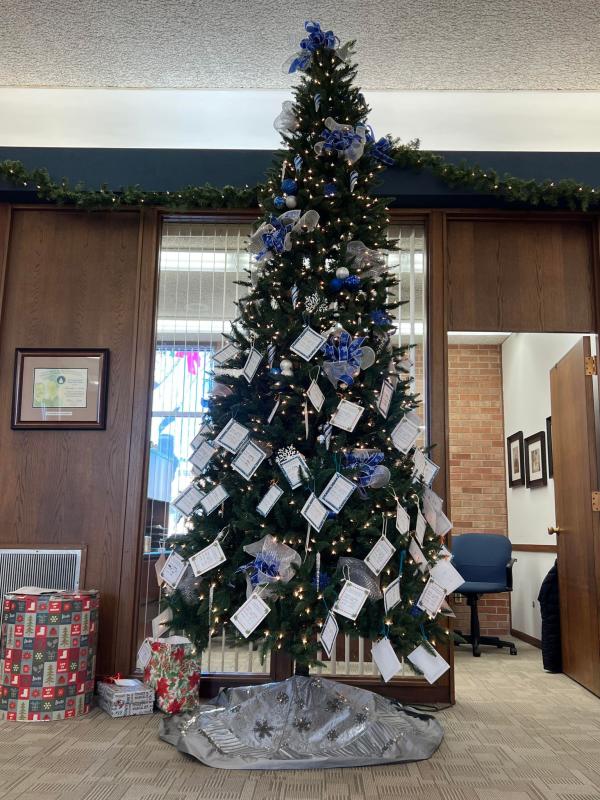 The tree with the gift tags at Farmers Savings Bank & Trust