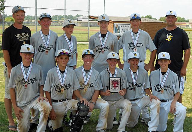 Viking 14U players and coaches pose with their medals; they finished 3rd in the USSSA event.