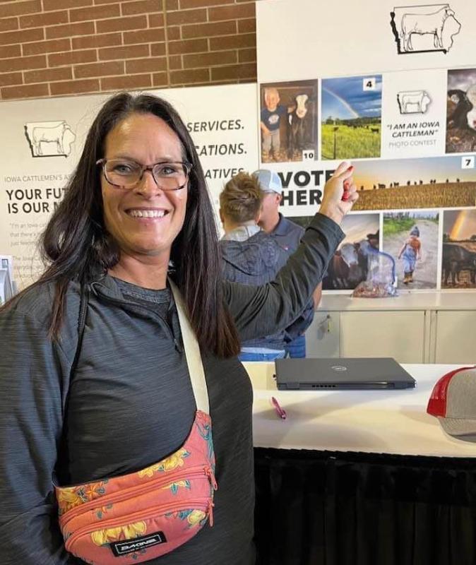 Ortner at the Iowa State Fair next to the Iowa Cattlemen's exhibit