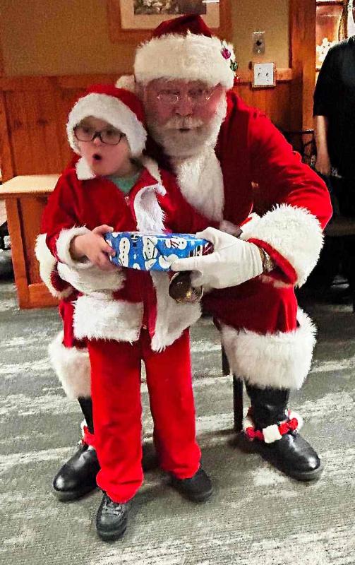 Dax Marter and Santa give a hearty