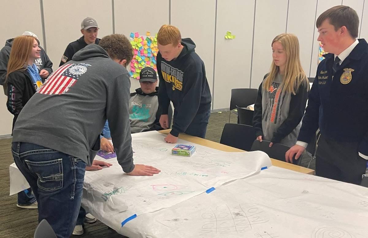 FFA member, Wesley McKenna shares with his group his ideas for the activity.