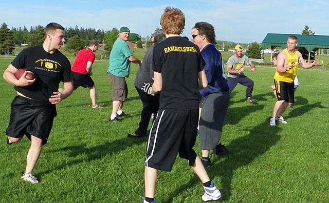 Joey Seidel ('10) runs the ball during practice for the V-S Alumni team.