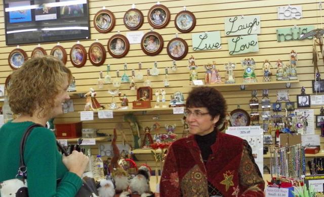 Jessica Levy speaks with visitors to the VU After Hours Friday evening at Jessy's Gems.