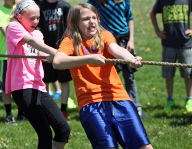 Alexis Bunten's face is full of determination during the Shellsburg Track & Field Day Tug-of-War.