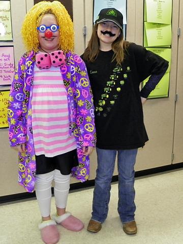 Antonym Day: Hannah McGowan and Tess Lillibridge wore quite different costumes.