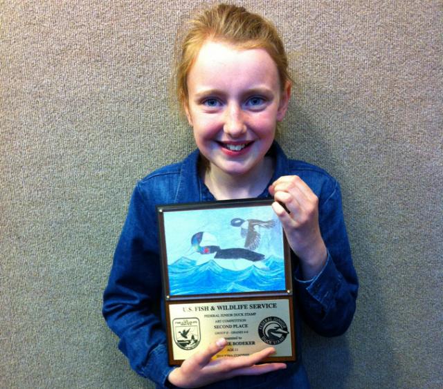Coralee Bodeker with her 2nd-place duck stamp drawing.