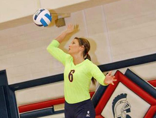 Former Vikette Ashley Strong serves for SWCC, which has earned a spot in the Nationals.