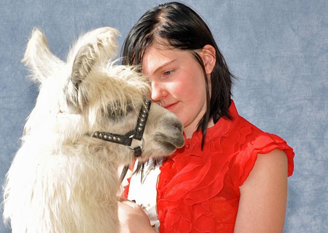 Aspen Auld of rural Van Horne and her llama received honors at the ALSA National Show of Champions.
