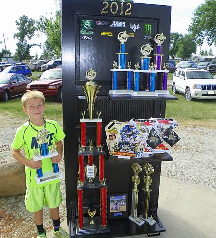 Austin Kemp's project for the 2012 Fair is a door modified to be a trophy shelf.