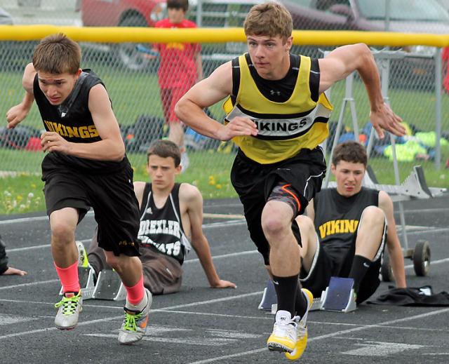 Axl Hoepner (right) won the shot put and discus and finished 2nd in the 100 for VS 8th grade.
