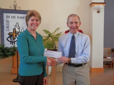 LuAnn Urlaub, President of the V-S Fine Arts Century Club and George Bauer, Congregation President.