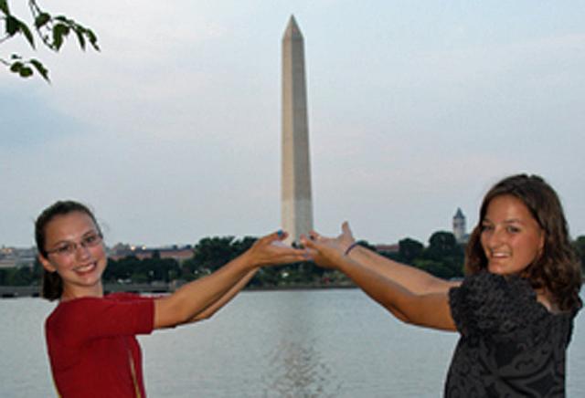 Clare Andreesen and Megan Ternus spent some time helping hold up the Washington Monument.