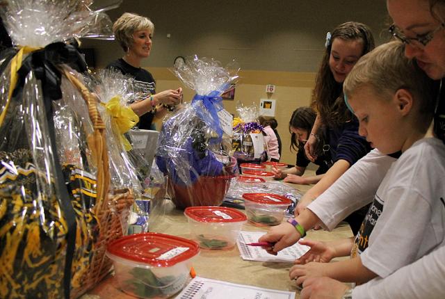 VS families enter the Post Prom basket raffle during Friday's basketball game.