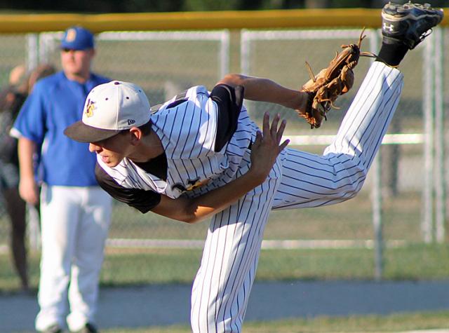 Alex Springer pitches in the first inning of the Vikings' game vs. Benton.