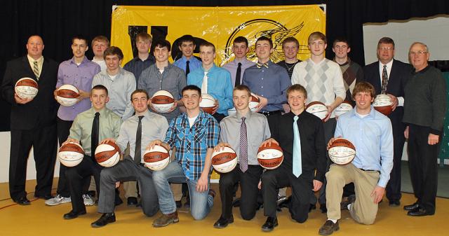 State tourney honor: Viking players and coaches received basketballs from the Iowa Farm Bureau.