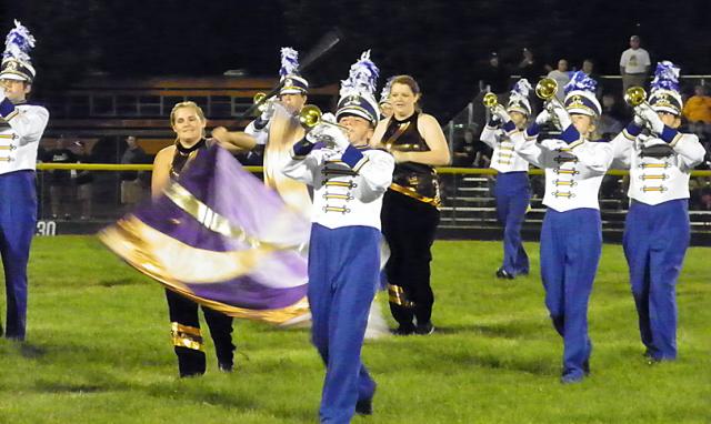 The Benton Community Band performs part of its 'Journey' show during halftime of Friday's game.