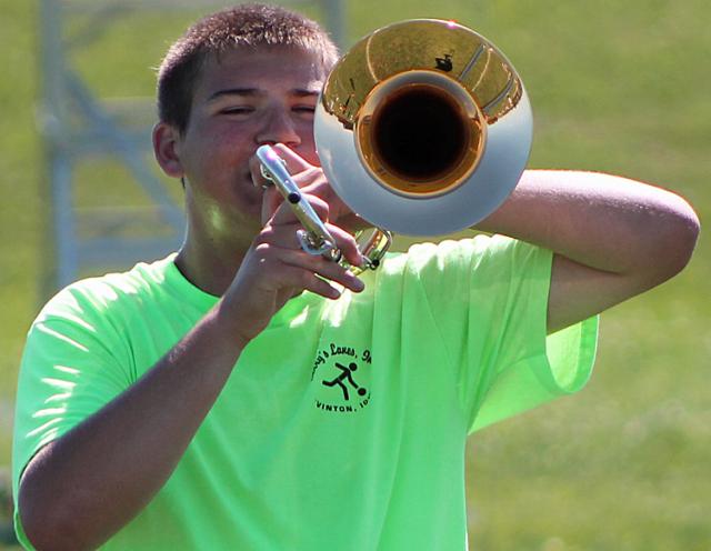Jacob Gosse plays the trombone during Band Camp.