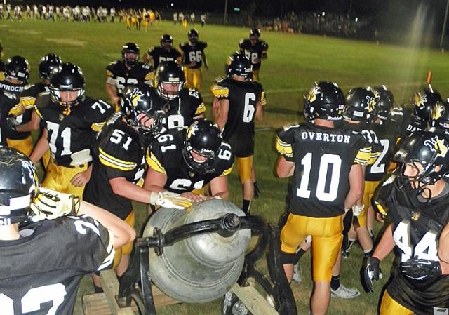 Vikings ring the Victory Bell after defeating Benton, 48-19, in Friday season opener.