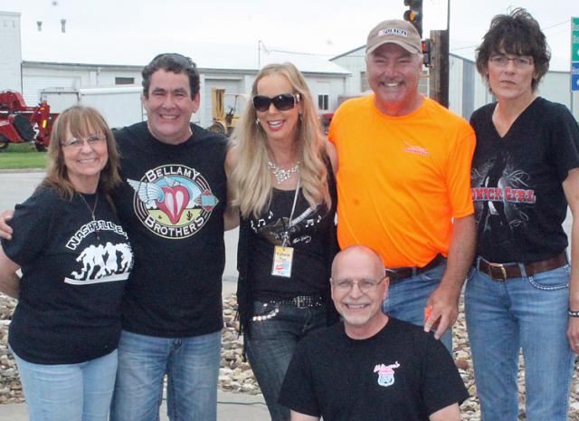 Terry Ehlinger, with Katheryn Foxx, and the Lindseys and Schlarbaums, during the Bellamy promo.