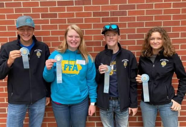 The Meats Evaluation team receives 10th place at state. From left to right are JR Becker, Kait Ballard, Marcus Ricklefs, and Katilynn Guldner.
