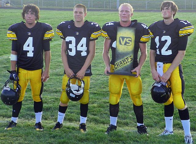Gunner Tranel (with the muffler) and other Black Squad members pose with the victory trophy.