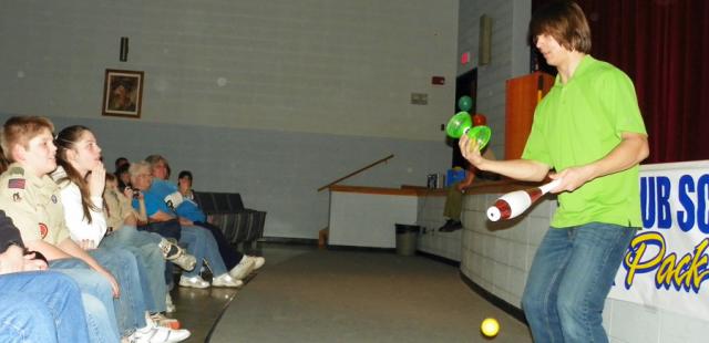 Dough Sayers impressed Cub Scouts and their families with his juggling skills Friday.