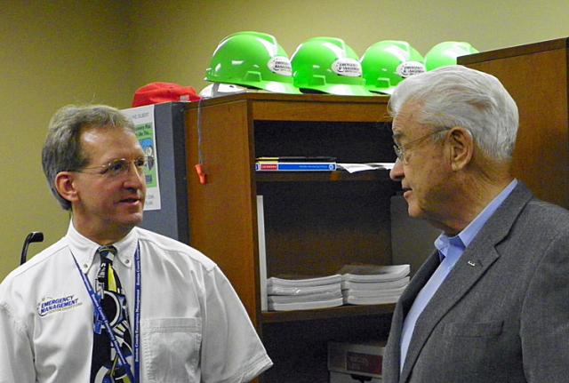 EMA Director Scott Hansen discusses the new EOC with Congressman Leonard Boswell