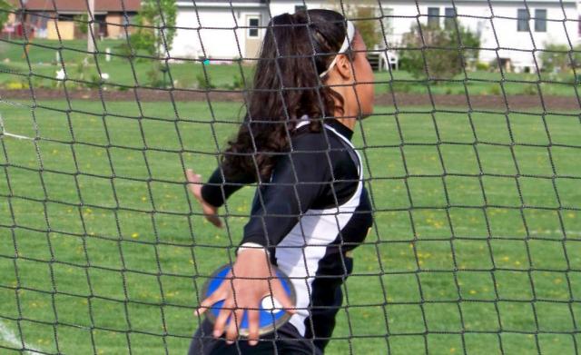 Brittany Robinson hurls the discus for 5th place for the Vikettes at home meet Tuesday night.