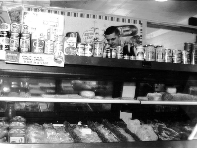Buzz Bolenbaugh at his meat counter in 1957.