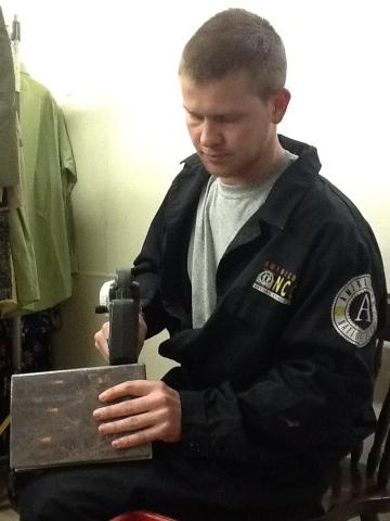 Corps Member Matt Bickers prices books.
