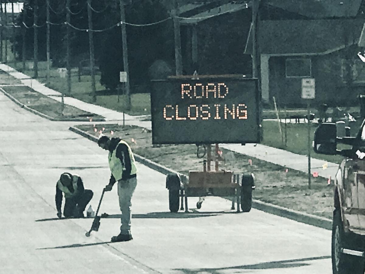 Construction workers are preparing to tear up West 1st St. for reconstruction