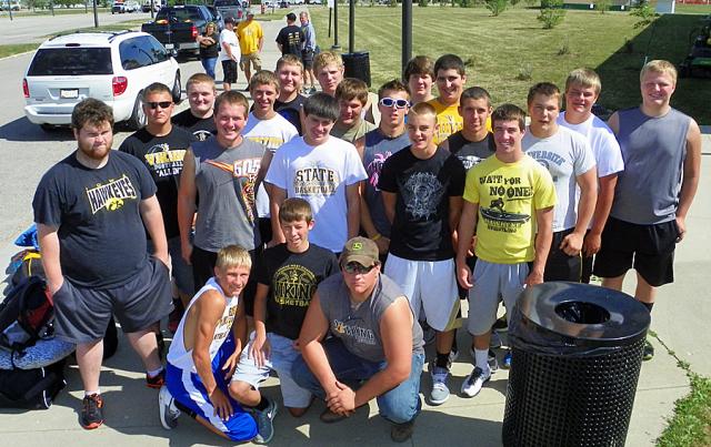 Viking football players left Vinton for Pella for the Central College Team Camp Wednesday.